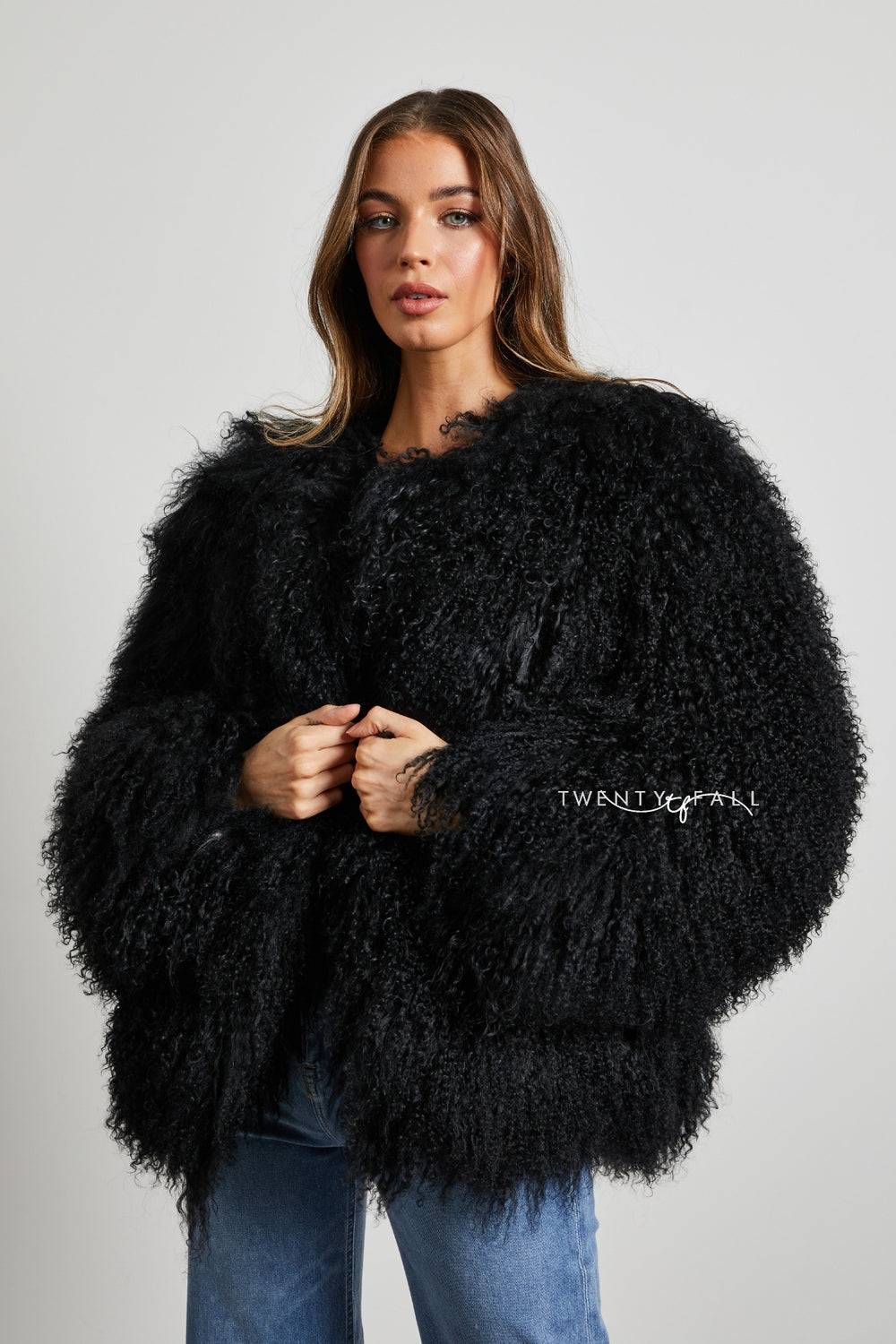 Black mongolian faux fur coat hotsell